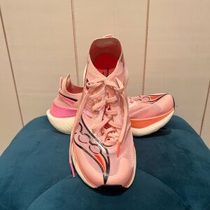 Saucony’s Elite Racing Shoe; Endorphin Elite size 8 women’s. Less than 10 mi.